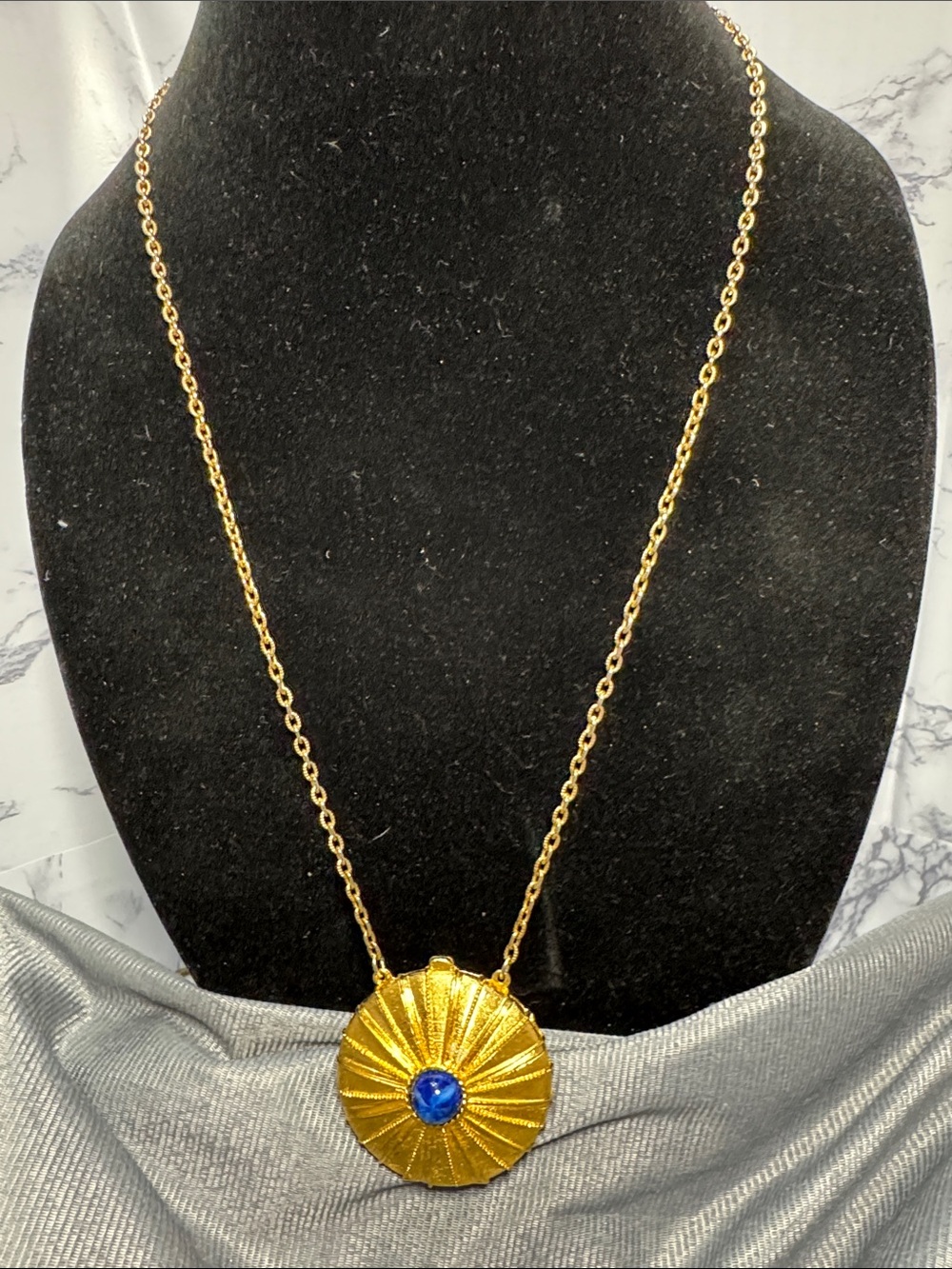 Estee Lauder Gold-Tone Pendant Necklace with Blue Stone